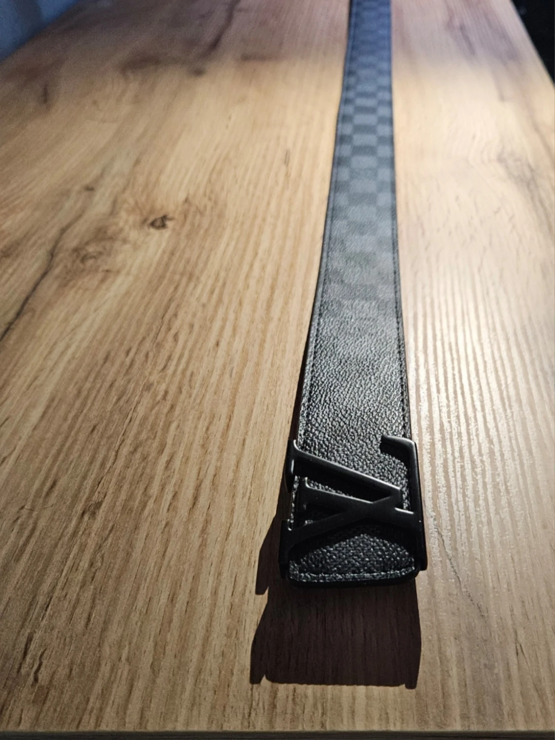 Rutigt svart bälte  - 5