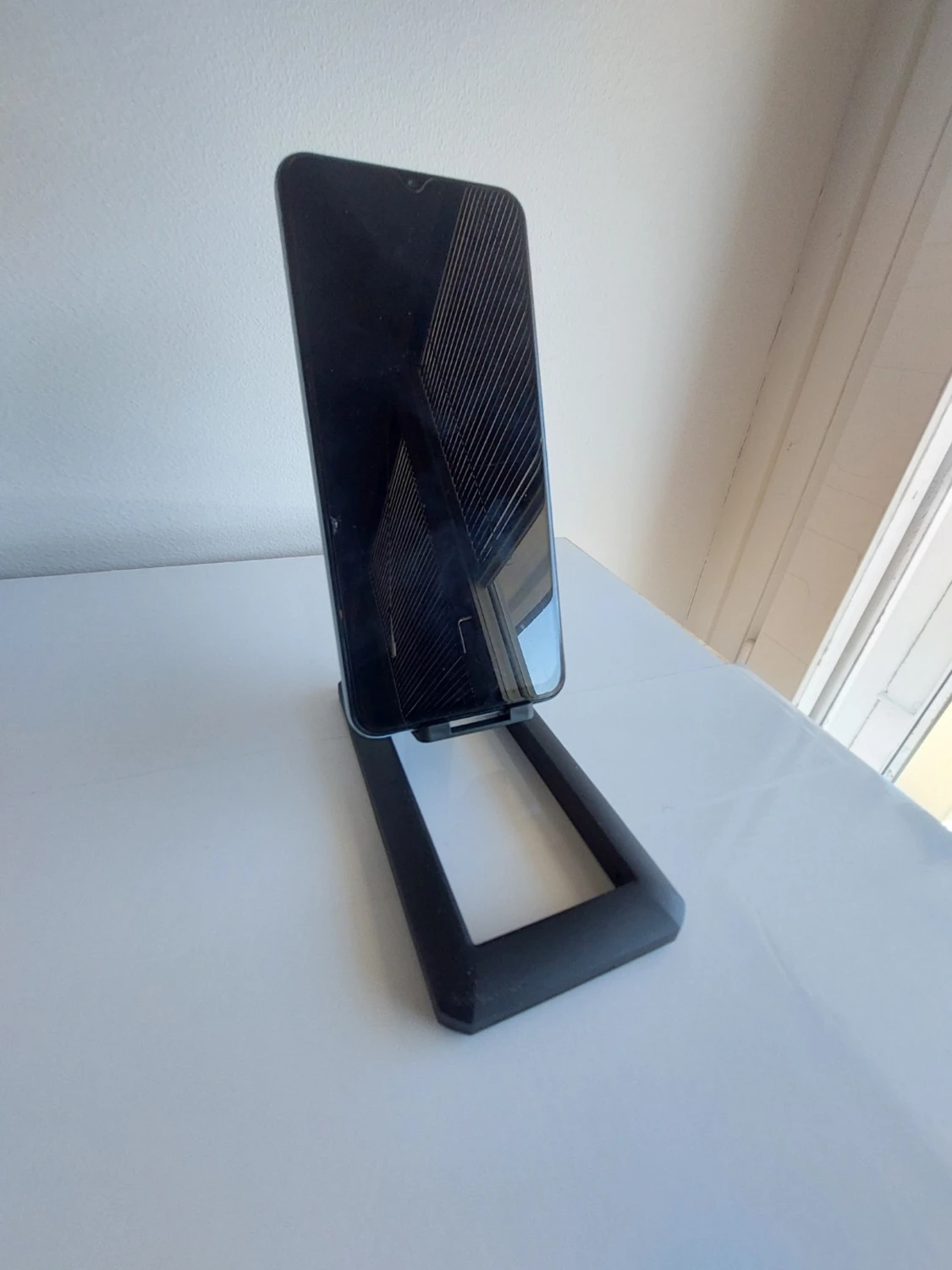 Vikbart mobiltelefonställ - 1