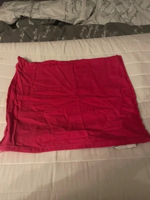 Rosa Kuddfodral  - Ett rosa Kuddfodral som är 50x50 