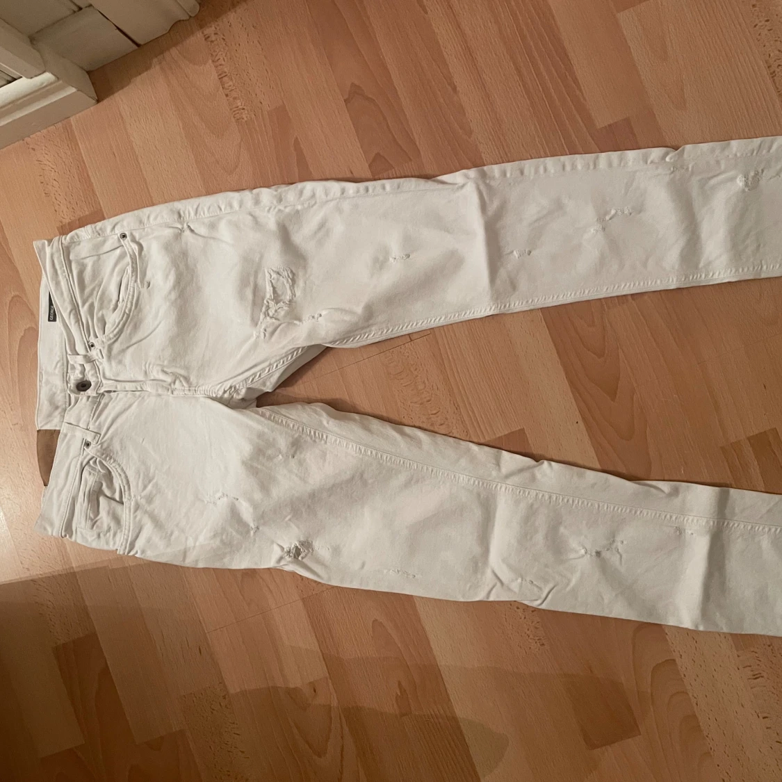 Vita jeansbyxor från dondup, stl 31 - 1