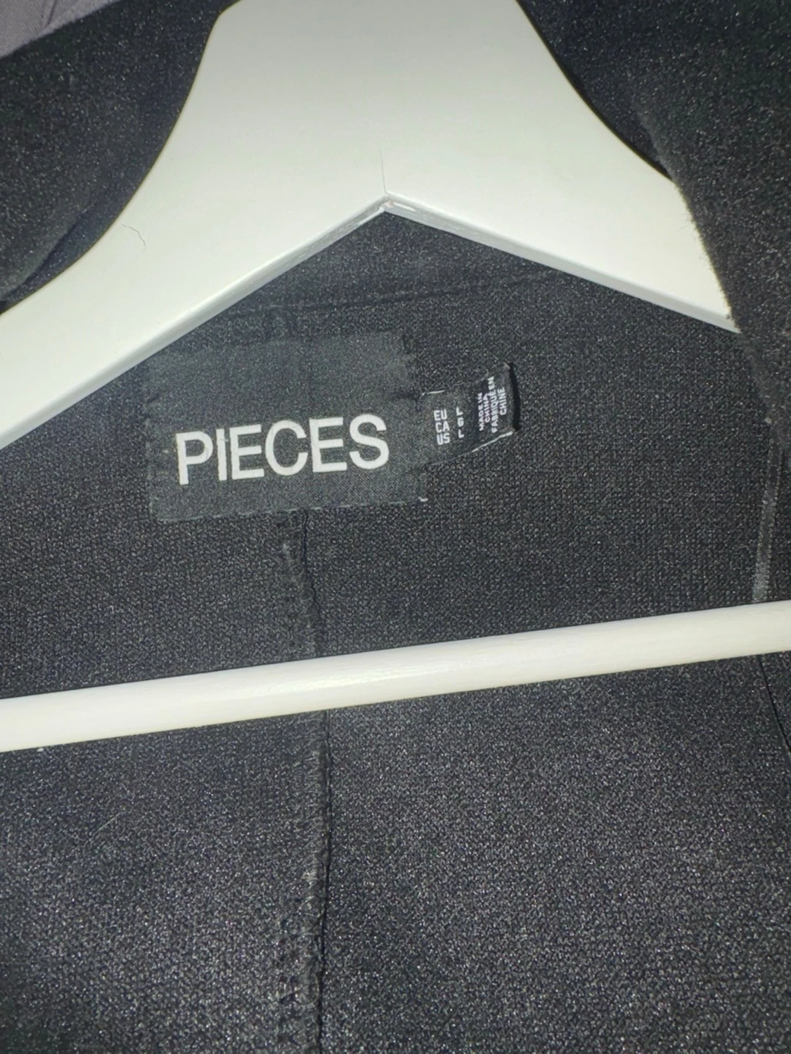 Svart  kappa från Nelly - 2