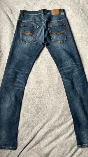 Blå jeans från Nudie - Modell Thinn finn, storlek W31 L34