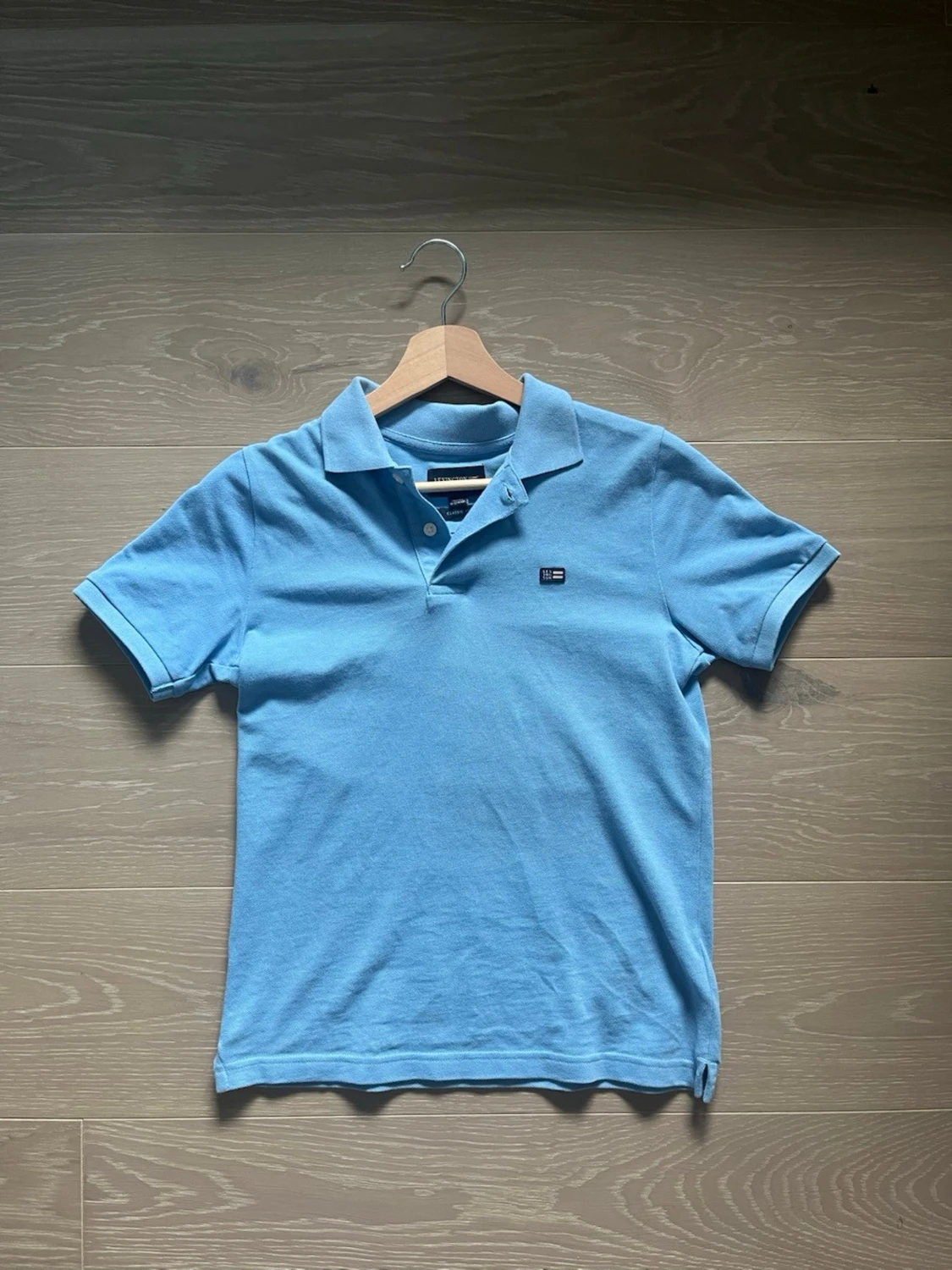 Blå pikétröja från Lexington