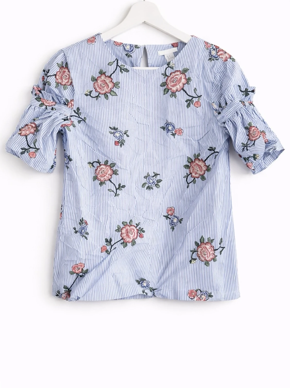 Blommig blus med volangärm från H&M