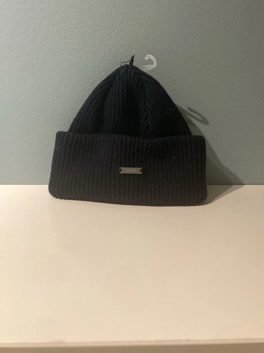 Mörkblå mössa från Sätila