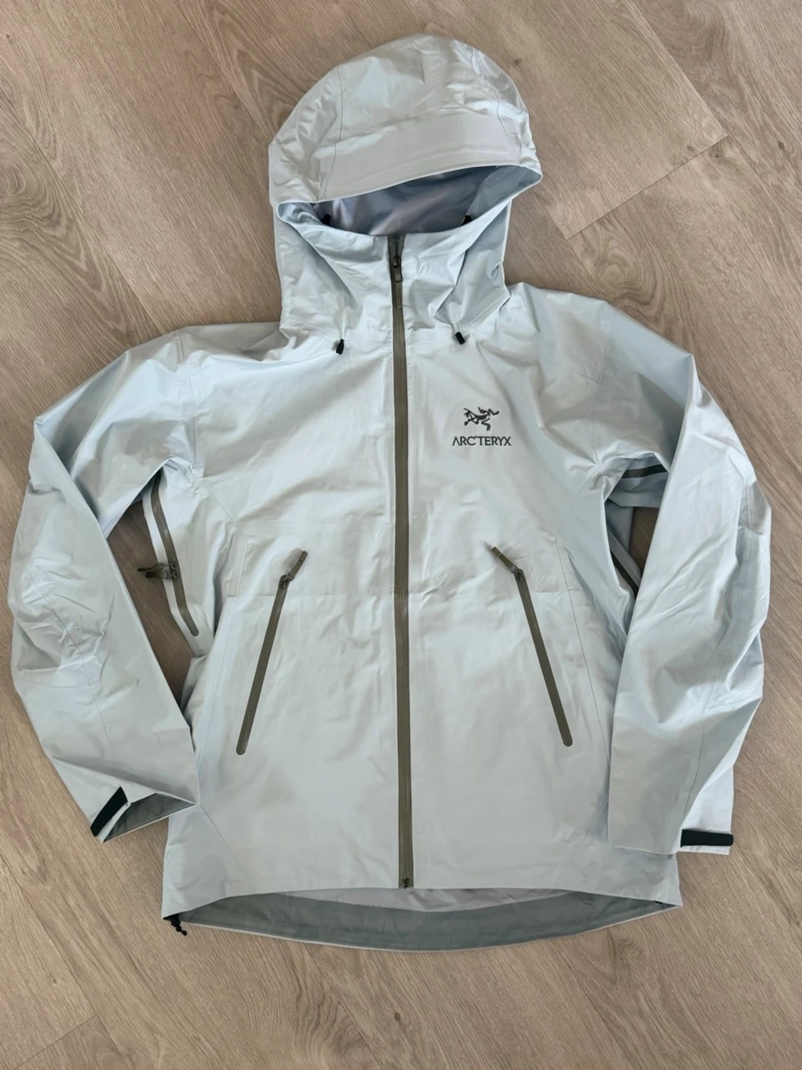 Baby blue Arc'teryx rain jacket - 1