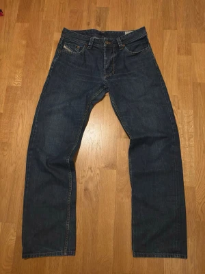 Vintage Diesel Jeans - Vintage straight leg jeans.  Brand: Diesel Tagged size: 31/32  Waist (flat): 40cm Length: 104cm Leg opening: 21cm  Follow my profile for 10% off your purchase!  More jeans available on my profile.  Nr: 35