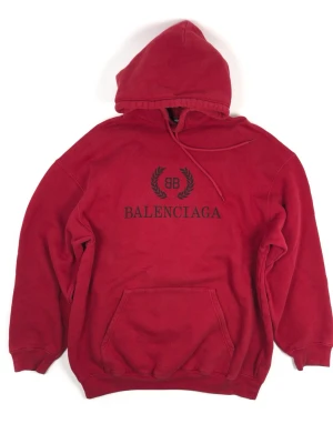 Balenciaga Oversized Hoodie - •The Hoodie has been gently used and is in very good condition •Size: fits L/XL •Color: Red•Retail price: 10000Sek •Pit to Pit: 64cm Length: 76cm