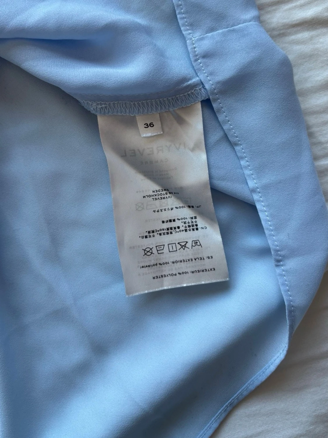 Ljusblå oneshoulder topp med volang - 3