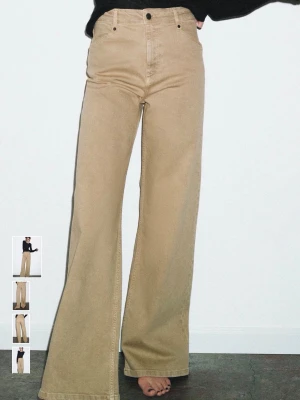 Beiga vida jeans med hög midja - Snygga beiga jeans med hög midja och vida ben. Klassisk femficksmodell med raka sömmar och knappgylf. Perfekta för en trendig och avslappnad look.
