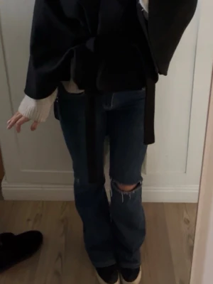 Low waist bootcut jeans - Blå low waist bootcut jeans från H&M