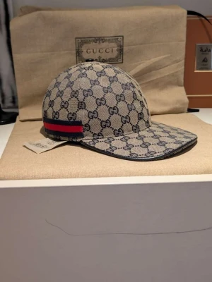 GG keps  - Helt ny GG keps I navy, storlek M 58cm, dustbag o tags medföljer 