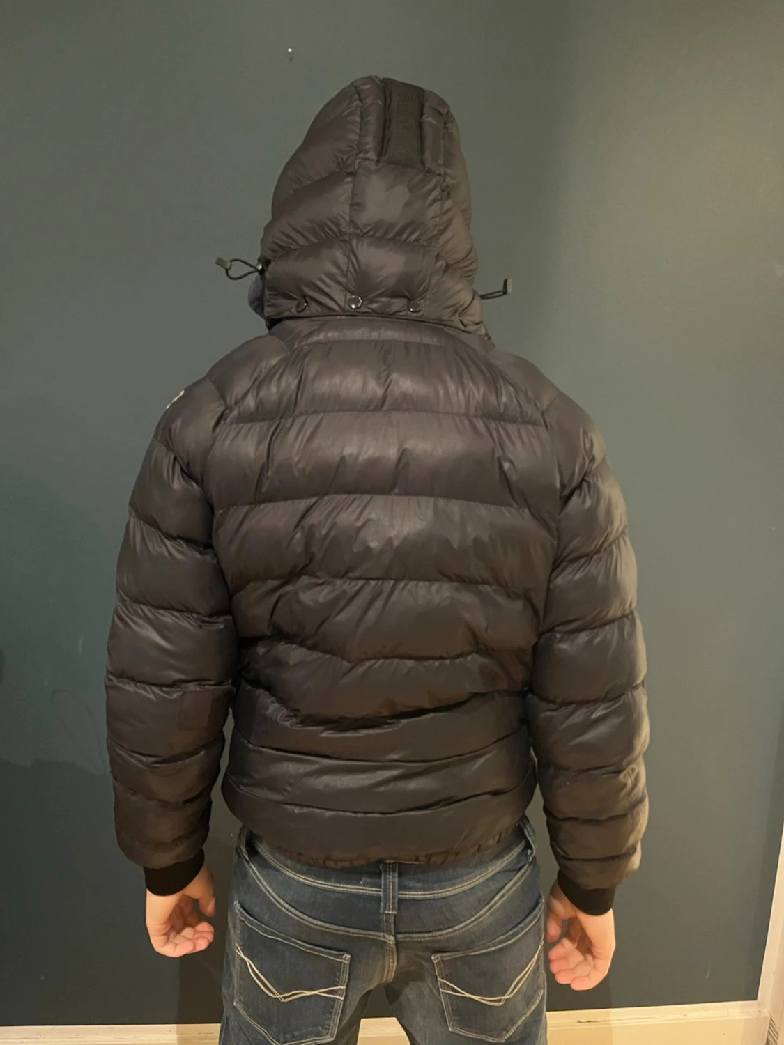 Svart dunjacka med huva Peak Performance - 1