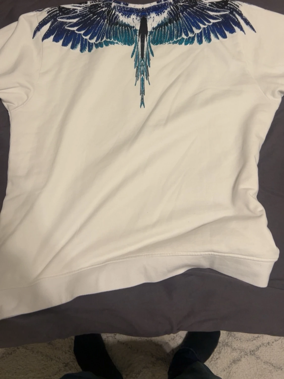 Vit sweatshirt med blått vingtryck - 1