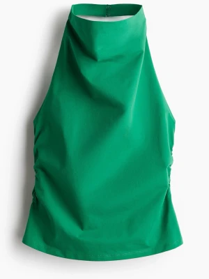 halterneck topp h&m - grön halterneck-topp från h&m, i storlek xs. öppen i ryggen. har en fläck (bild 3) annars i fint skick. skriv vid intresse eller frågor💕