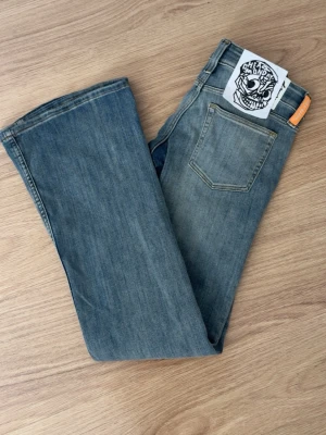 Bootcut jeans från Cheap Monday - Snygga blå bootcut jeans från Cheap Monday med låg midja och superstretch💕💕