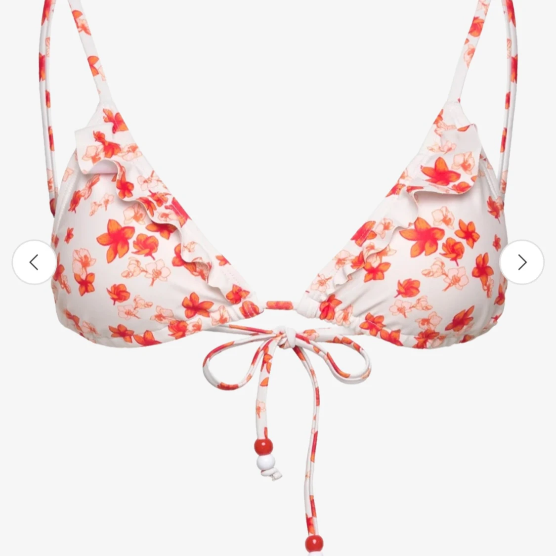 Blommig bikiniöverdel med volang