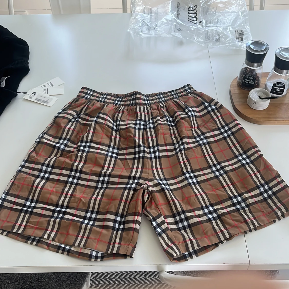 Rutig Burberry shorts i beige M