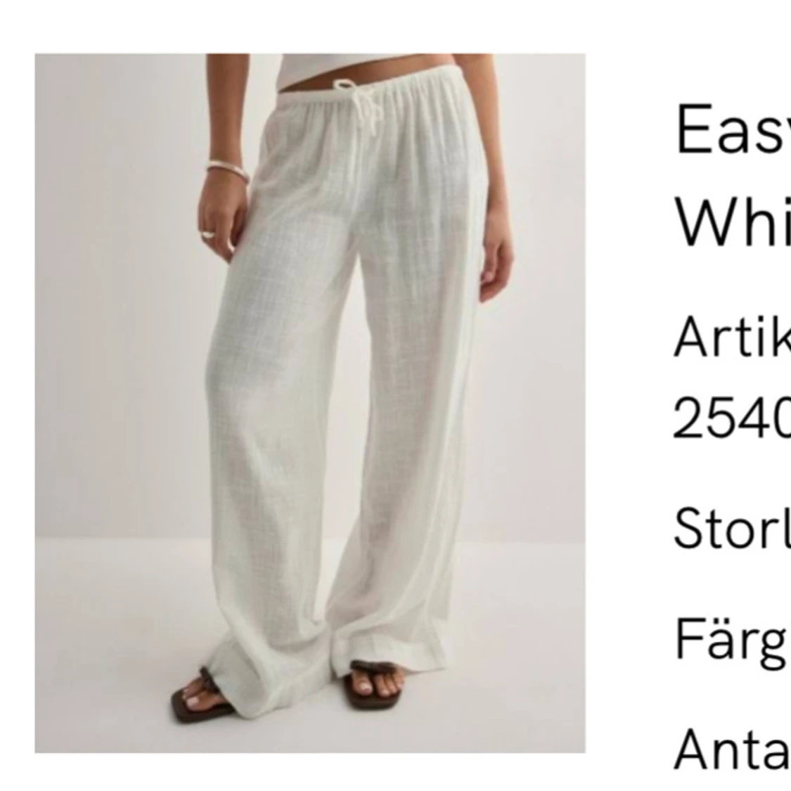 Vita linnebyxor från Nelly med snörning