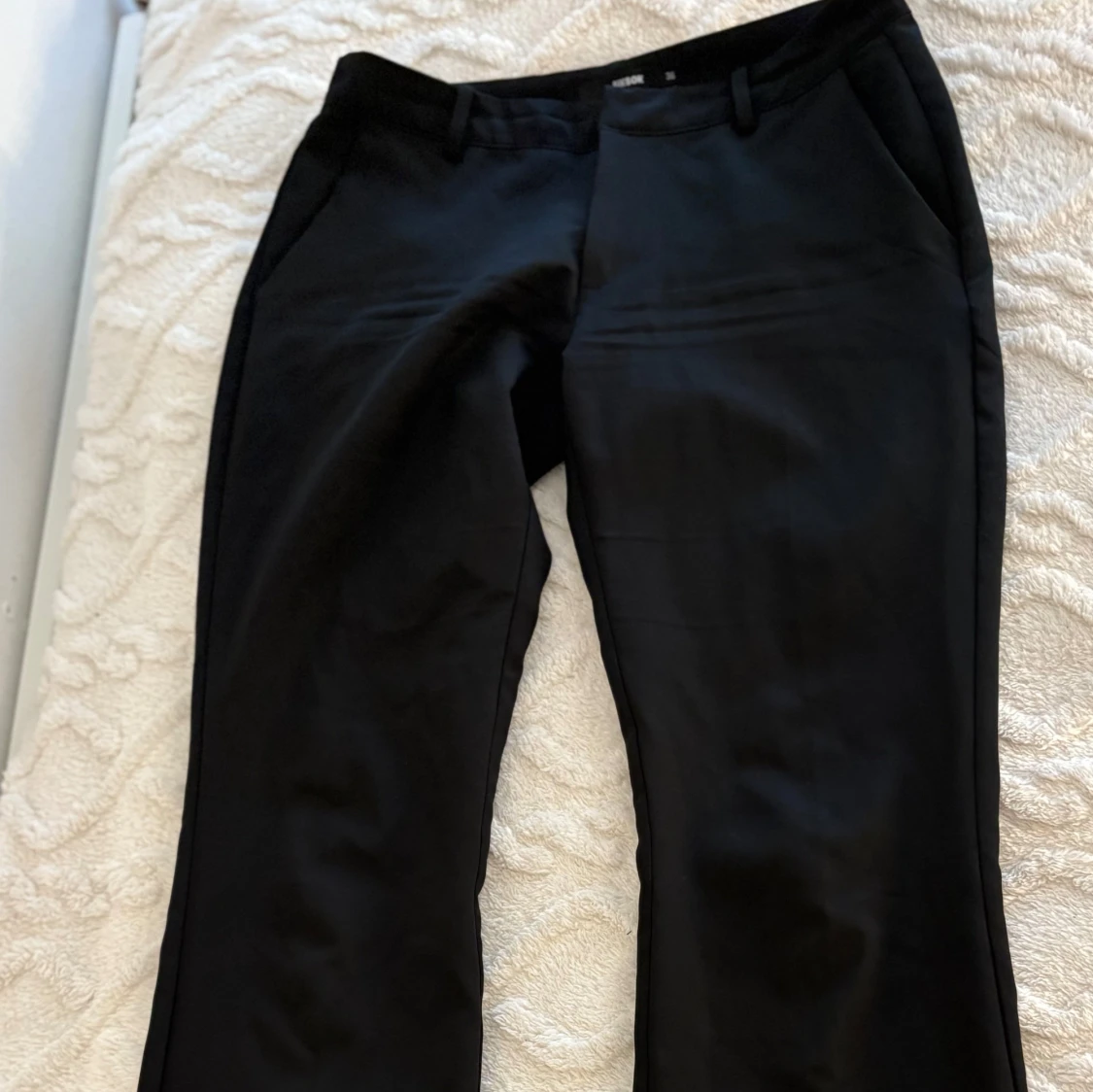 Svarta kostymbyxor med raka ben