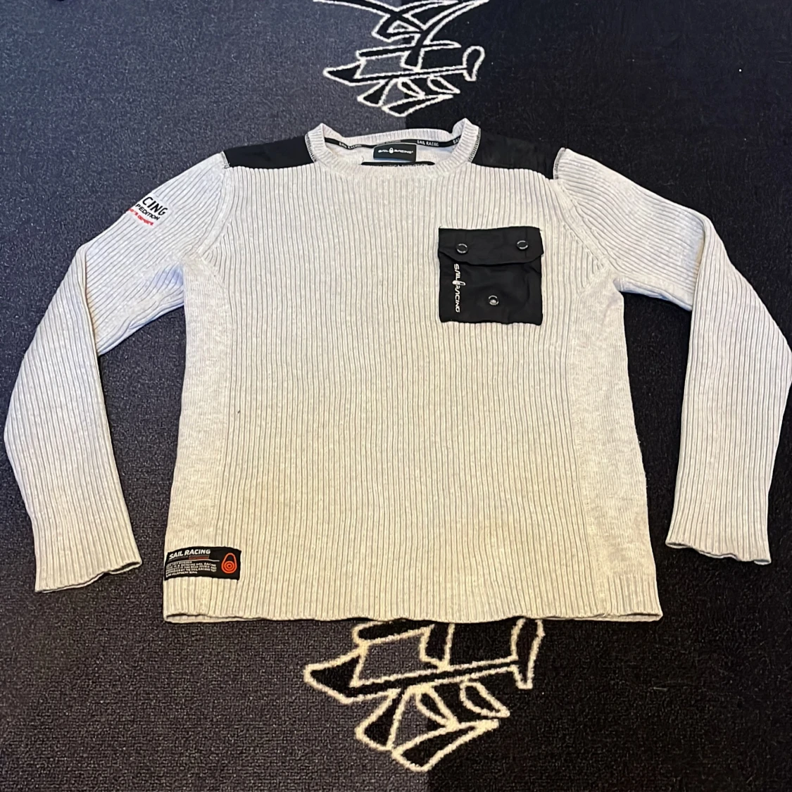 Ljusgrå ribbad tröja från Sail Racing