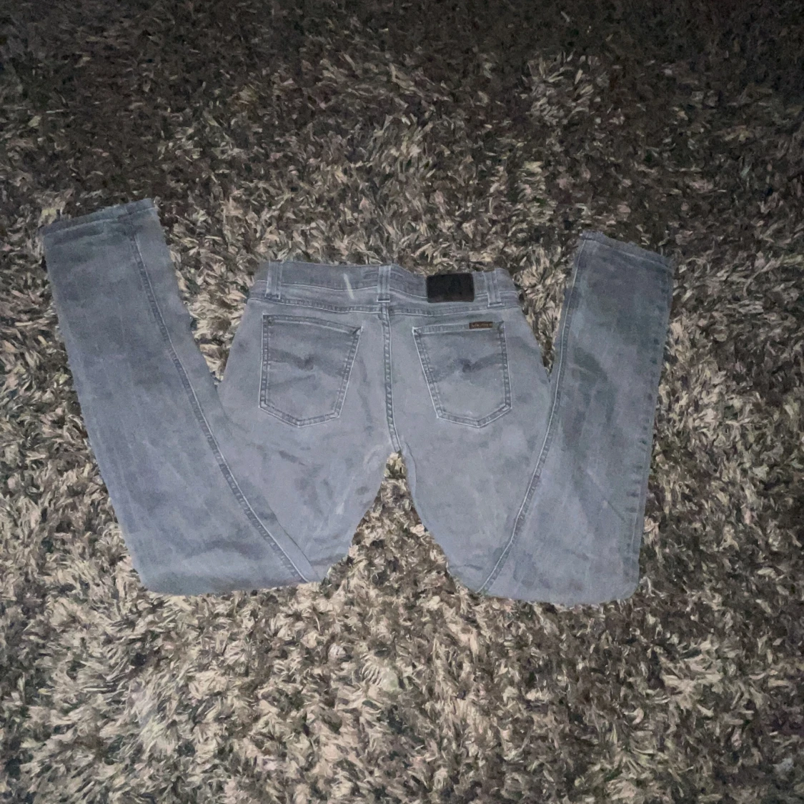 Ljusgrå jeansbyxor från Nudie Jeans - 1