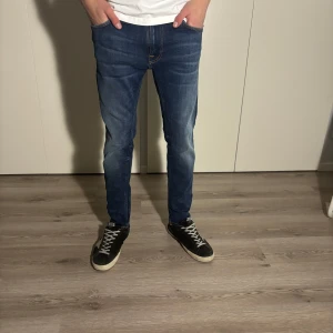 Nudie Jeans - Säljer ett par helt nya Nudie jeans med lapparna fortfarande kvar. Storleken är W30/L30. Hör av dig vid minsta fundering!