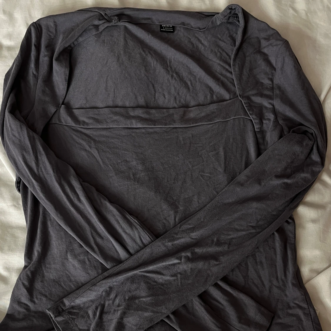 Mörkgrå långärmad tröja