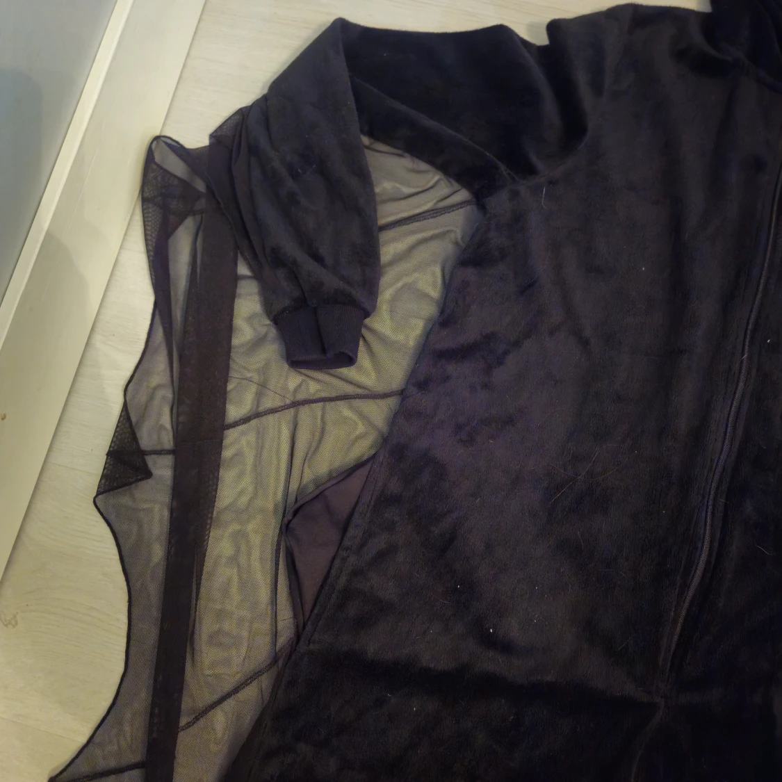 Svart fladdermusdräkt från Divided XS/S - 1