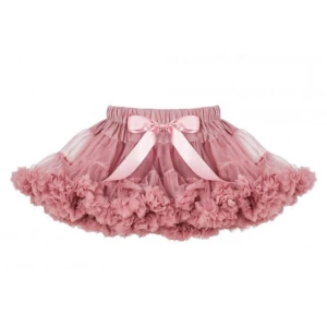 Rosa tyllkjol med rosett från Happiloo - Supersöt rosa tyllkjol från Happiloo med fluffiga volanger och en stor sidenrosett framtill. Kjolen har resår i midjan och är perfekt för dig som vill sticka ut med en gullig och lekfull look. Materialet är mjukt och ger kjolen extra volym.