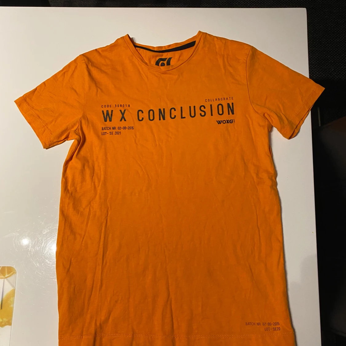 Orange t-shirt från Woxo med tryck