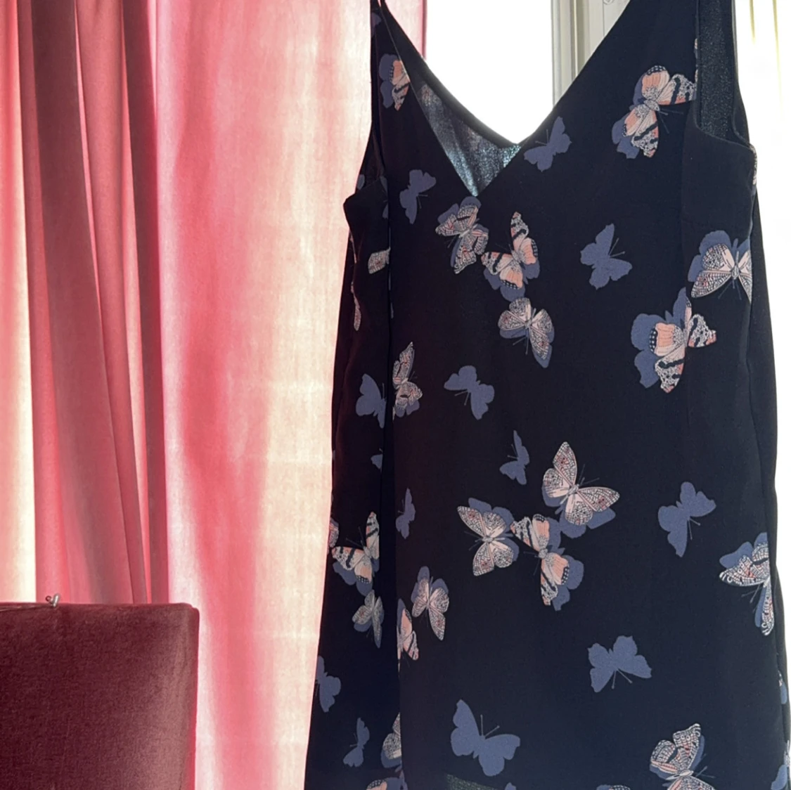 Svart linnetopp med fjärilar från Oasis - 2