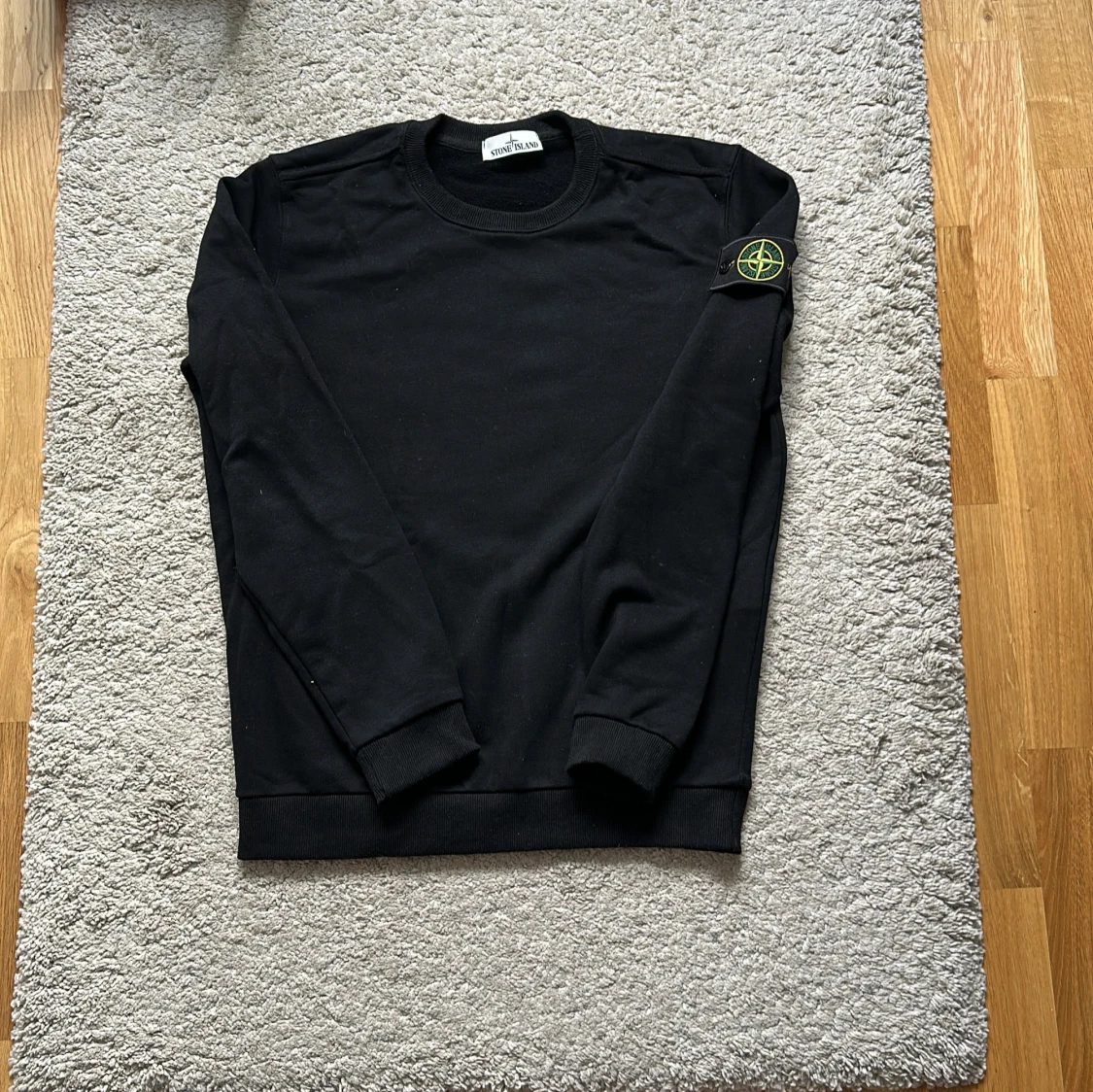 Svart sweatshirt från Stone Island