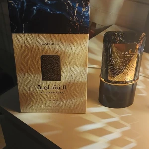 Lattafa Al Nashama Caprice - Nästan full