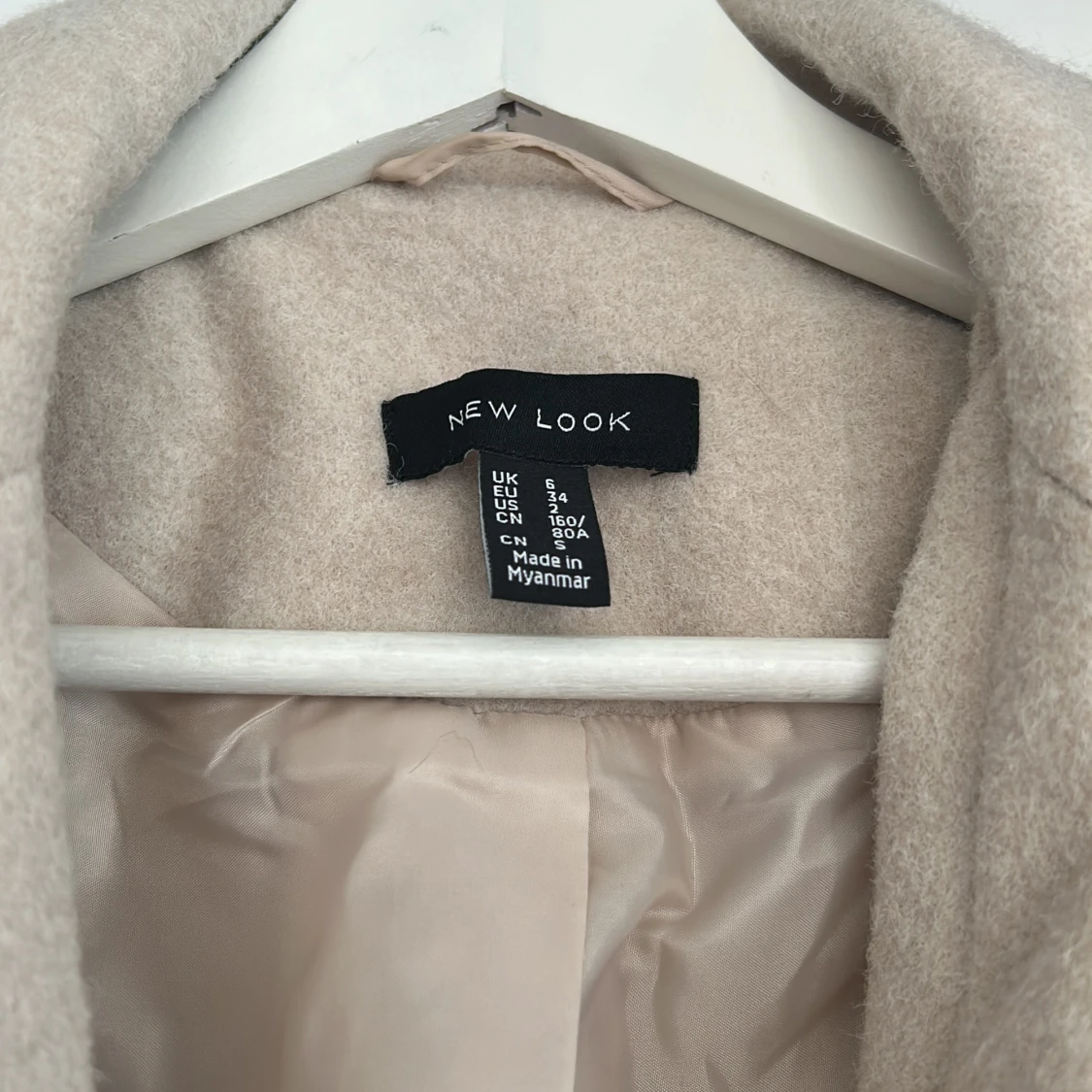 Beige kappa från New Look - 2