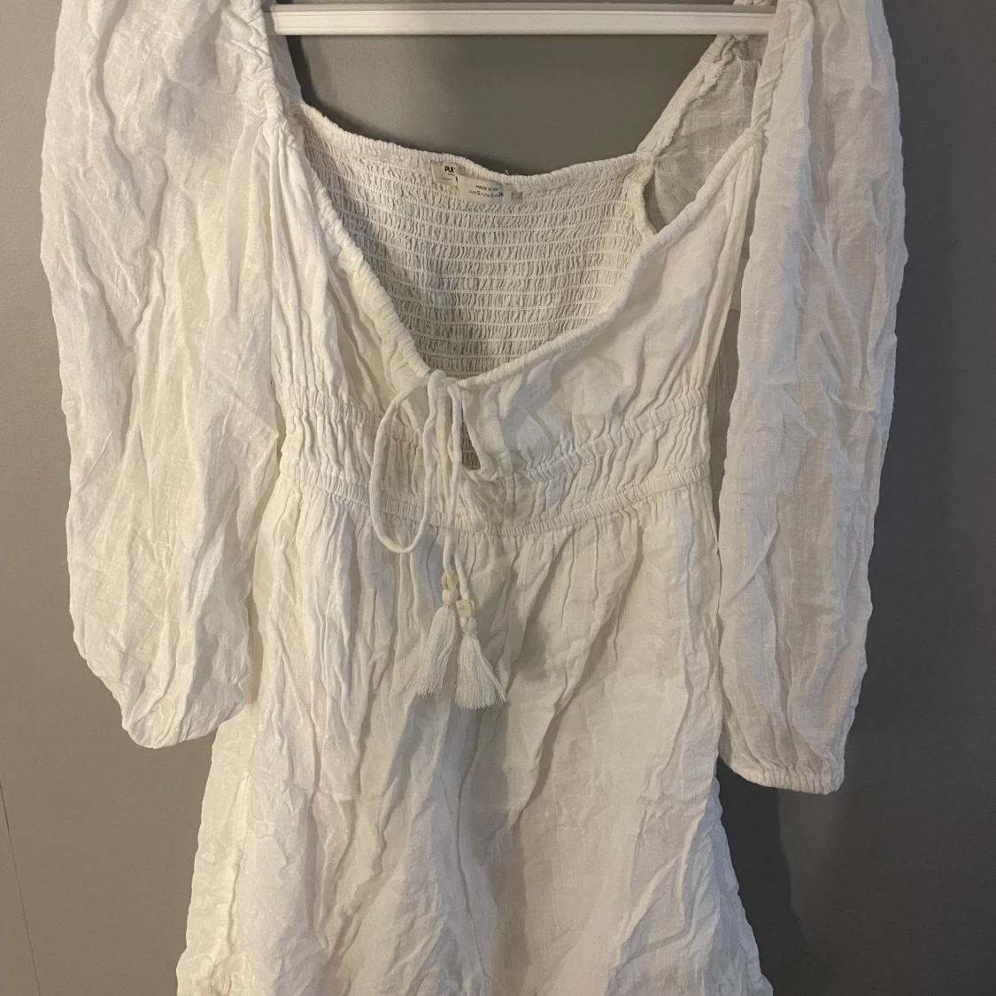 Vit klänning med snörning