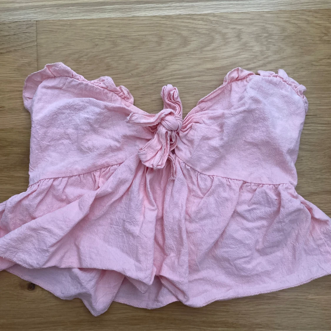 Rosa bandeau topp med knyt