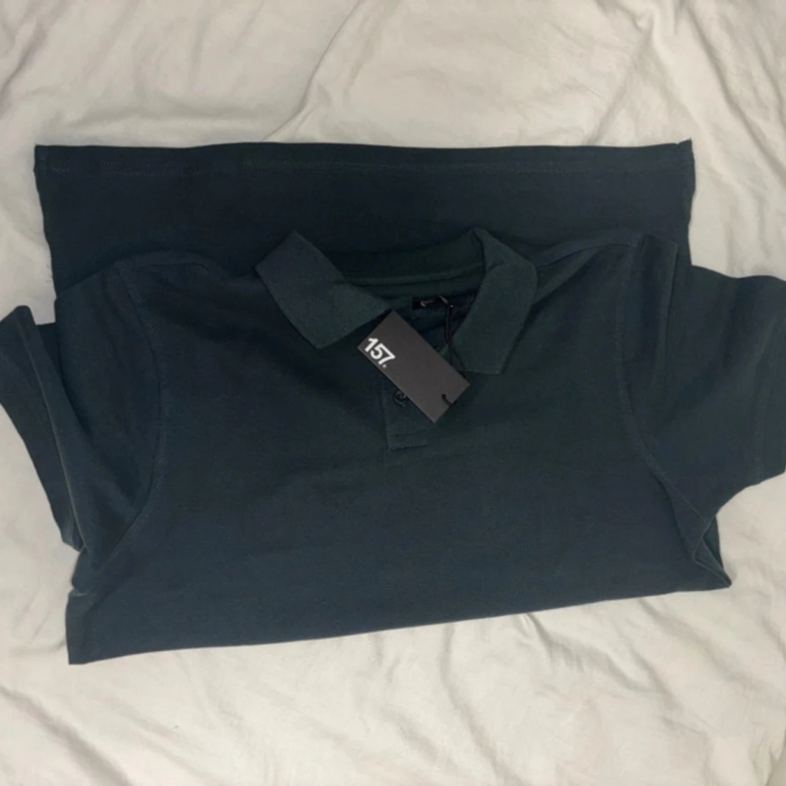 Mörkgrön pikétröja från 157 - 2