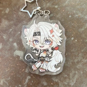 Wuthering waves Lingyang keychain - Keychain of Lingyang from Wuthering waves! Perfect for your bag decorations or collection :)  (There might be scratches on the surface but that’s only on the protective layer of plastic, peel it off on both sides and it’ll be perfectly shiny!)