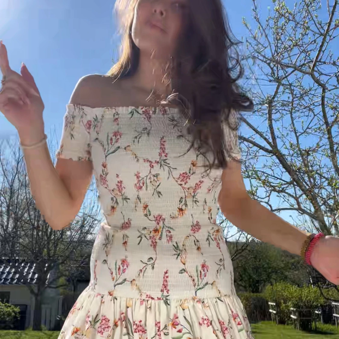 Blommig smockad k länning från hm  - 2