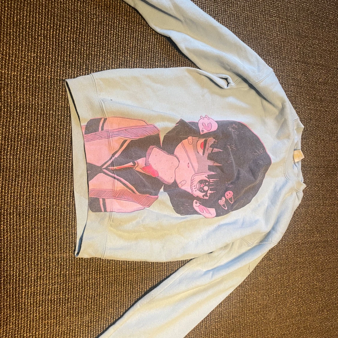 Ljusblå anime-tröja 