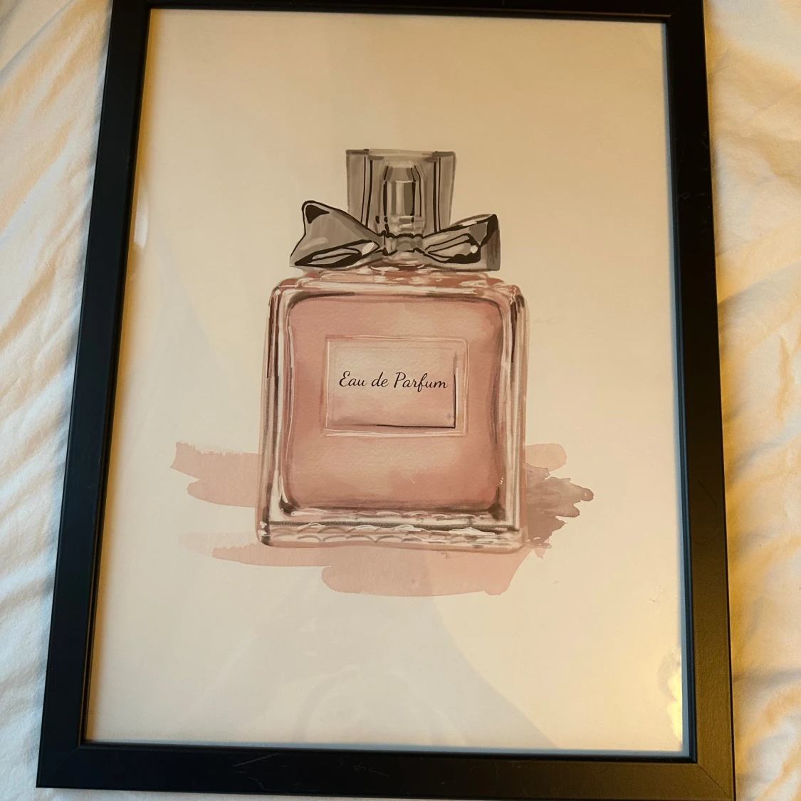 Tavla med parfymmotiv