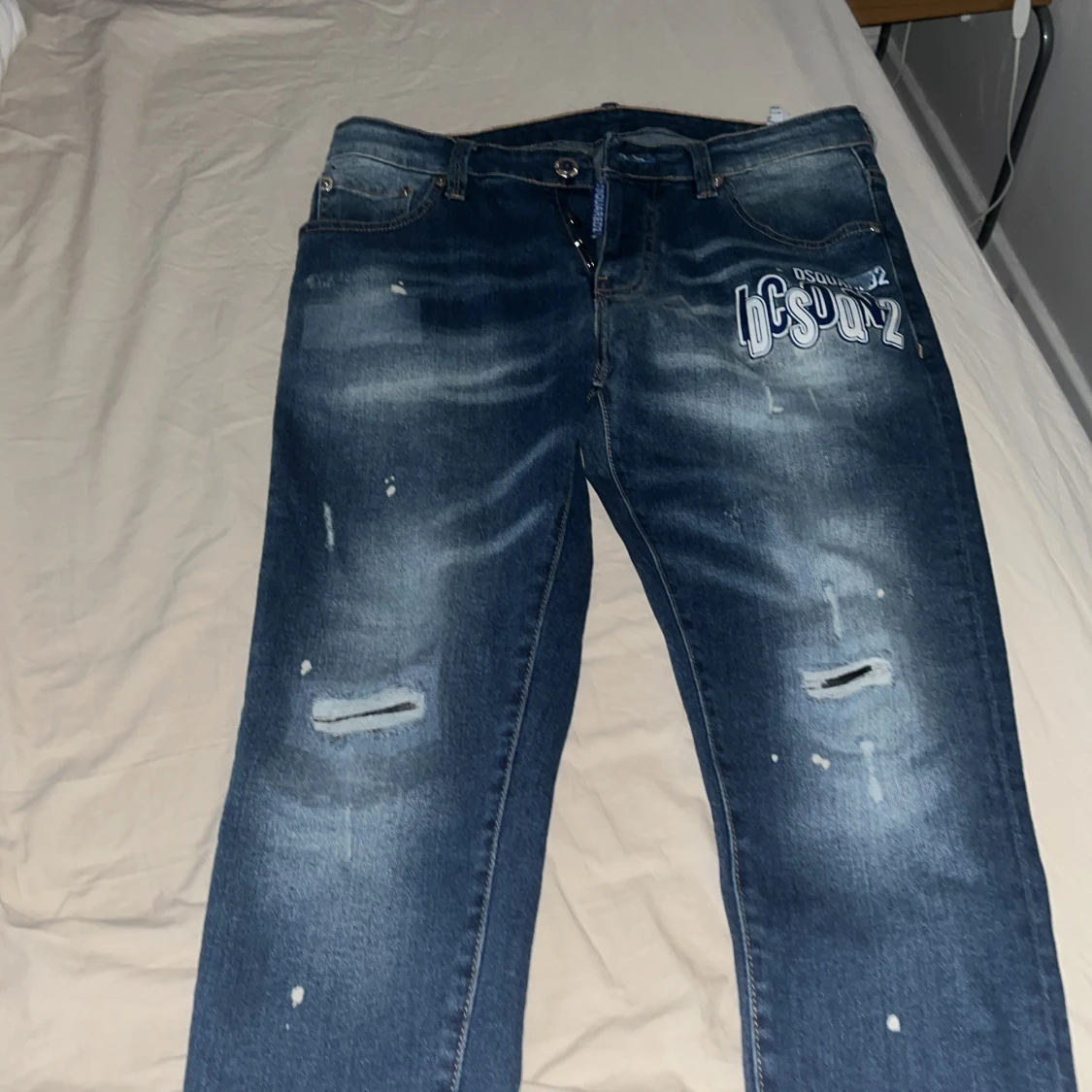 Blå Dsquared2 jeans med tryck och slitningar - 1