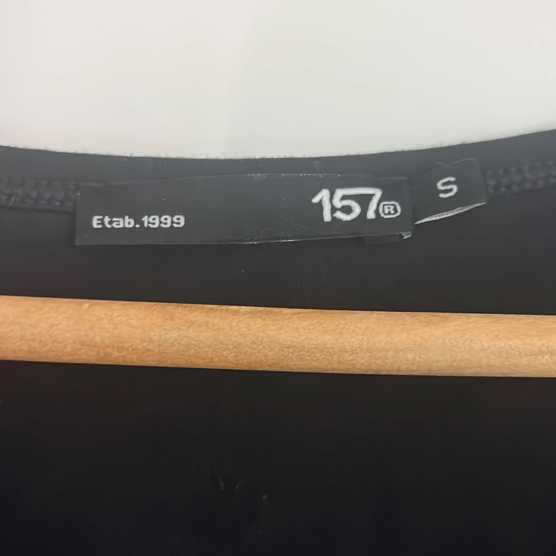 Svart omlottopp från 157 - 2