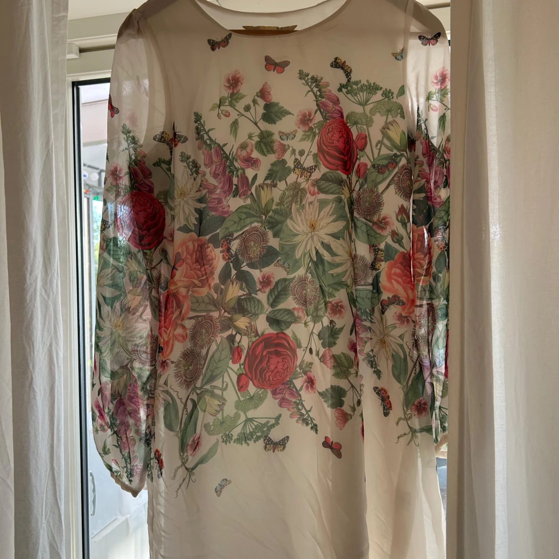 Blommig klänning från Yumi