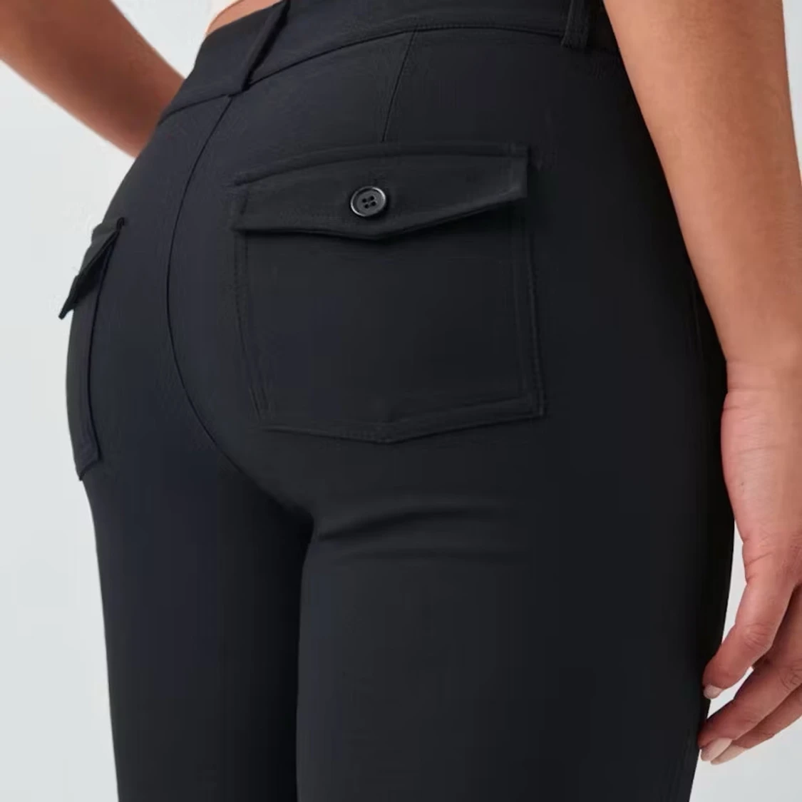 Svarta bootcut kostymbyxor med fickor