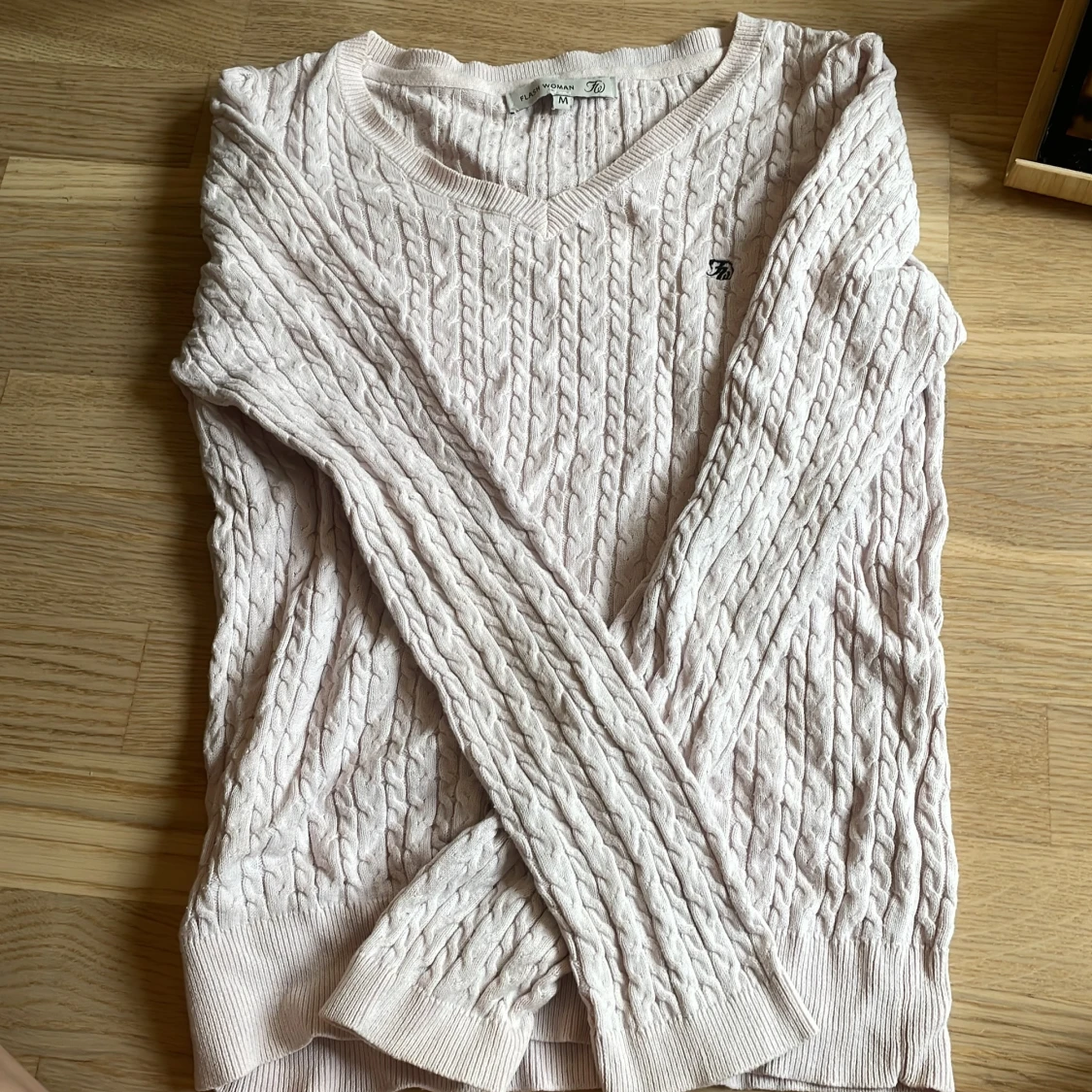 Ljusrosa kabelstickad tröja från Flash Woman