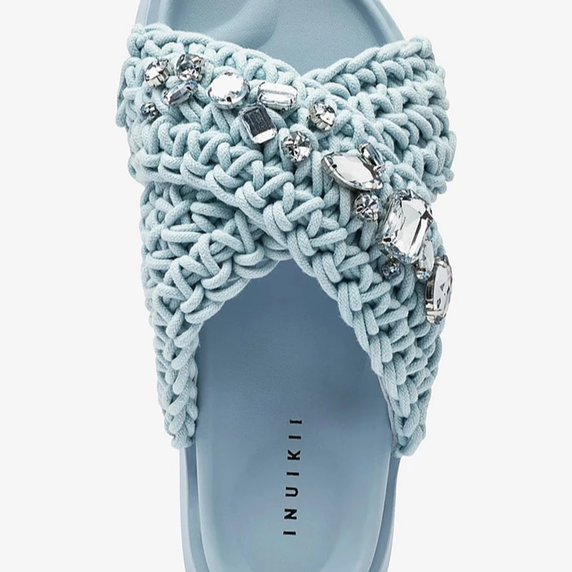 Blå stickade sandaler från Inuikii