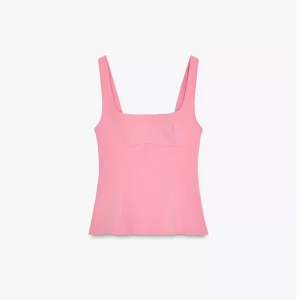 Rosa linnetopp med rosett från Zara - Supersöt rosa linnetopp från Zara med breda axelband och fyrkantig urringning. Baksidan har en rosett som ger en extra touch. Toppen är perfekt för varma dagar. 