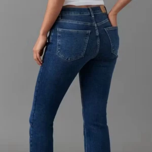 Low waist bootcut  - Blåa lågmidjade boutcut jeans från Gina tricot i storlek 36 helt nya passar folk i xs-s nypris 499 döljer billigare helt oanvända 